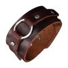 bracelet de force en cuir marron avec anneau central et rivets en acier inoxydable