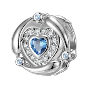 charm cœur bleu en argent et zircons sertis sur bijou rond