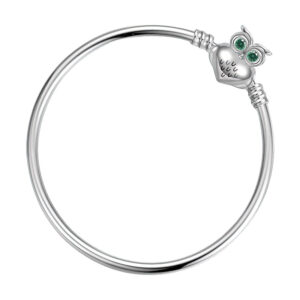 bracelet rigide en argent fermoir hibou zircon vert