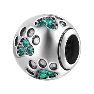 charm sphérique en argent avec empreintes en zircon vert