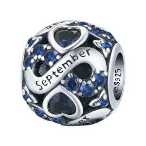 Charm mois de septembre en argent et cristaux bleus profonds.